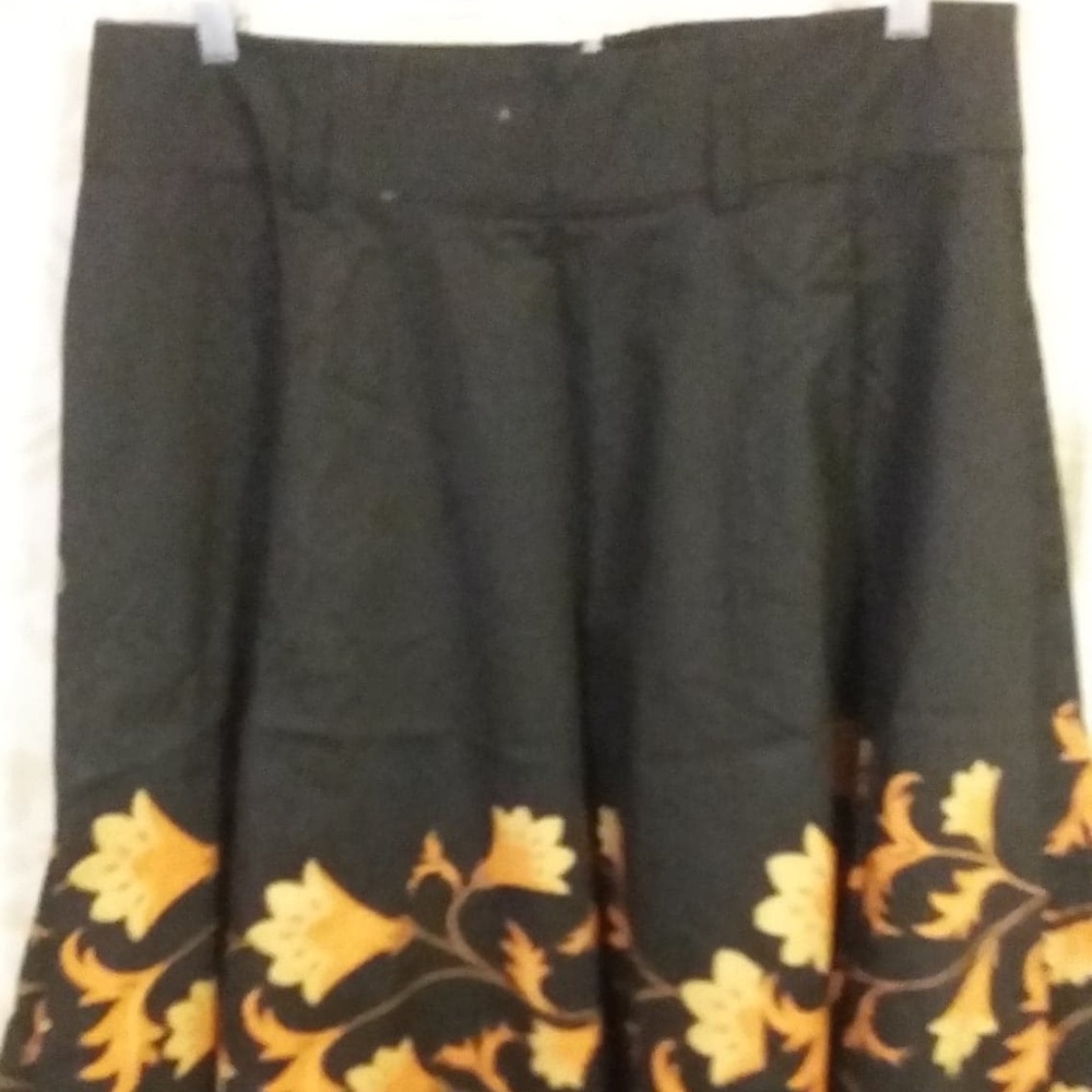 Black circle skirt with orange and yellow hem